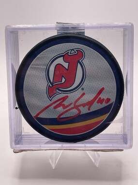Akira Schmid Autographed New Jersey Devils Reverse Retro Hockey Puck